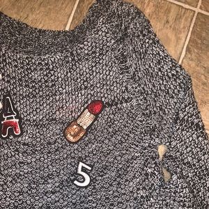 Backless sweater with cute detail